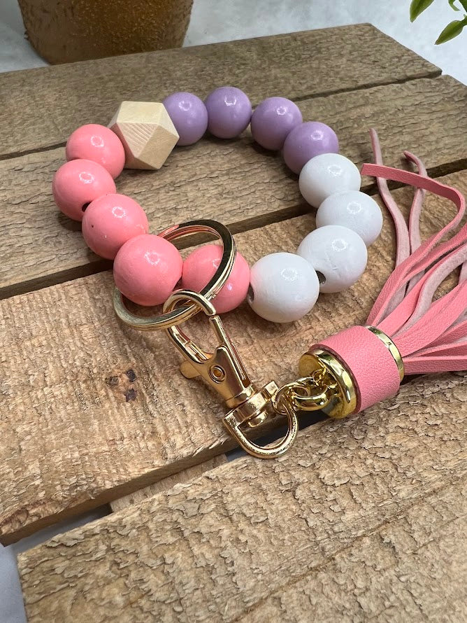 Fun & Trendy Pink and Purple Keychain Bracelet with Pink Tassel