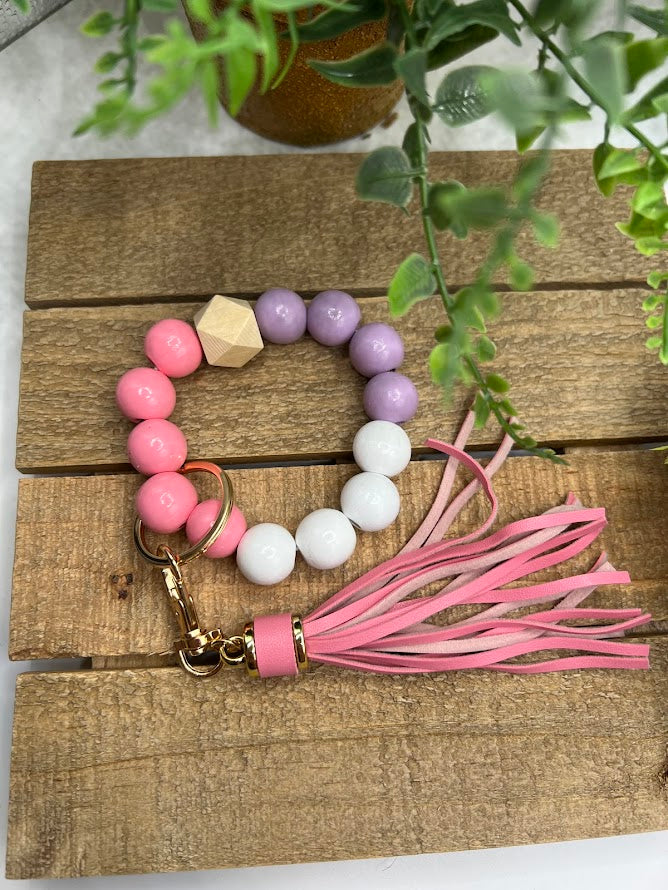 Fun & Trendy Pink and Purple Keychain Bracelet with Pink Tassel