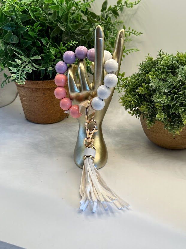 Feminine Pink, Purple, And White Beaded Tassel Key Ring