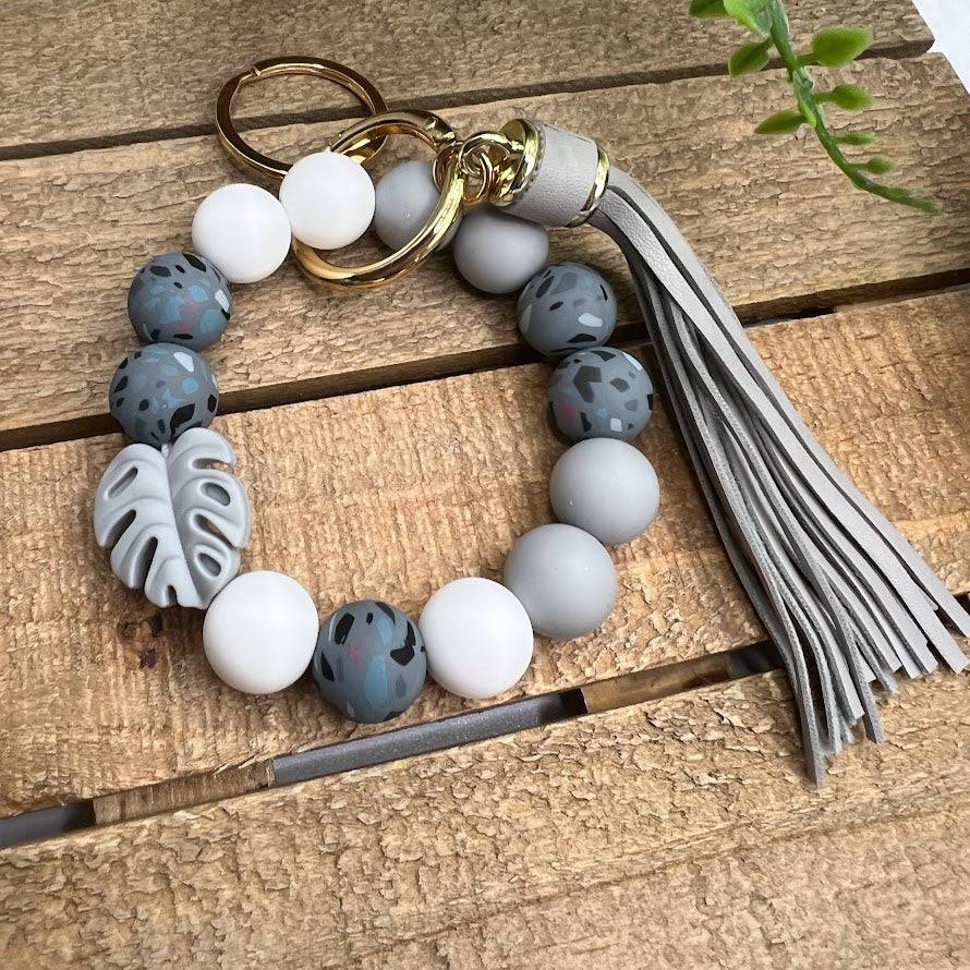 Stylish Grey Dark Island Silicone Beaded Bracelet Keychain with Tassel